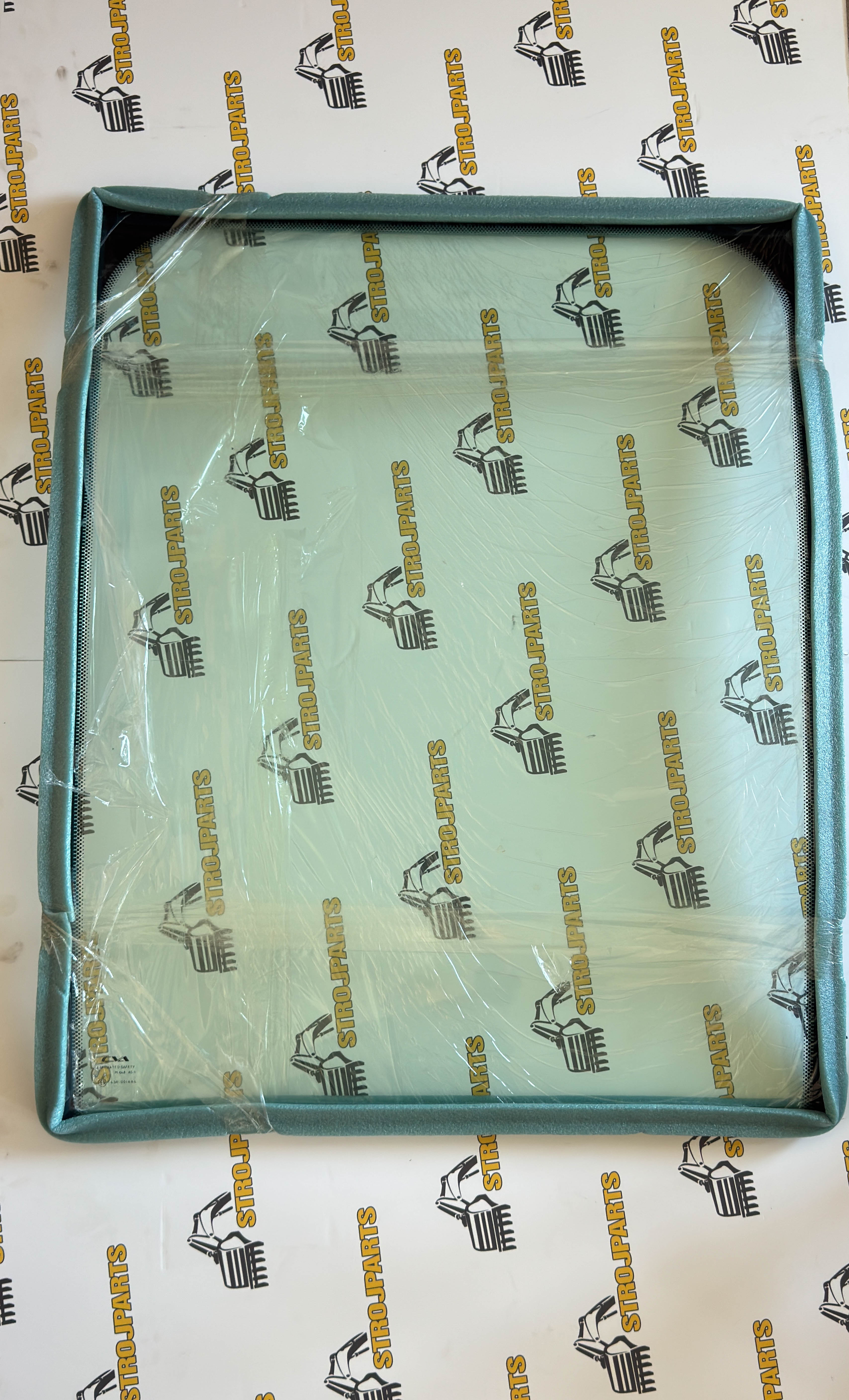 ČELNÍ SKLO HORNÍ LAMINOVANÉ ZELENÉ SE SÍTOTISKEM LIEBHERR