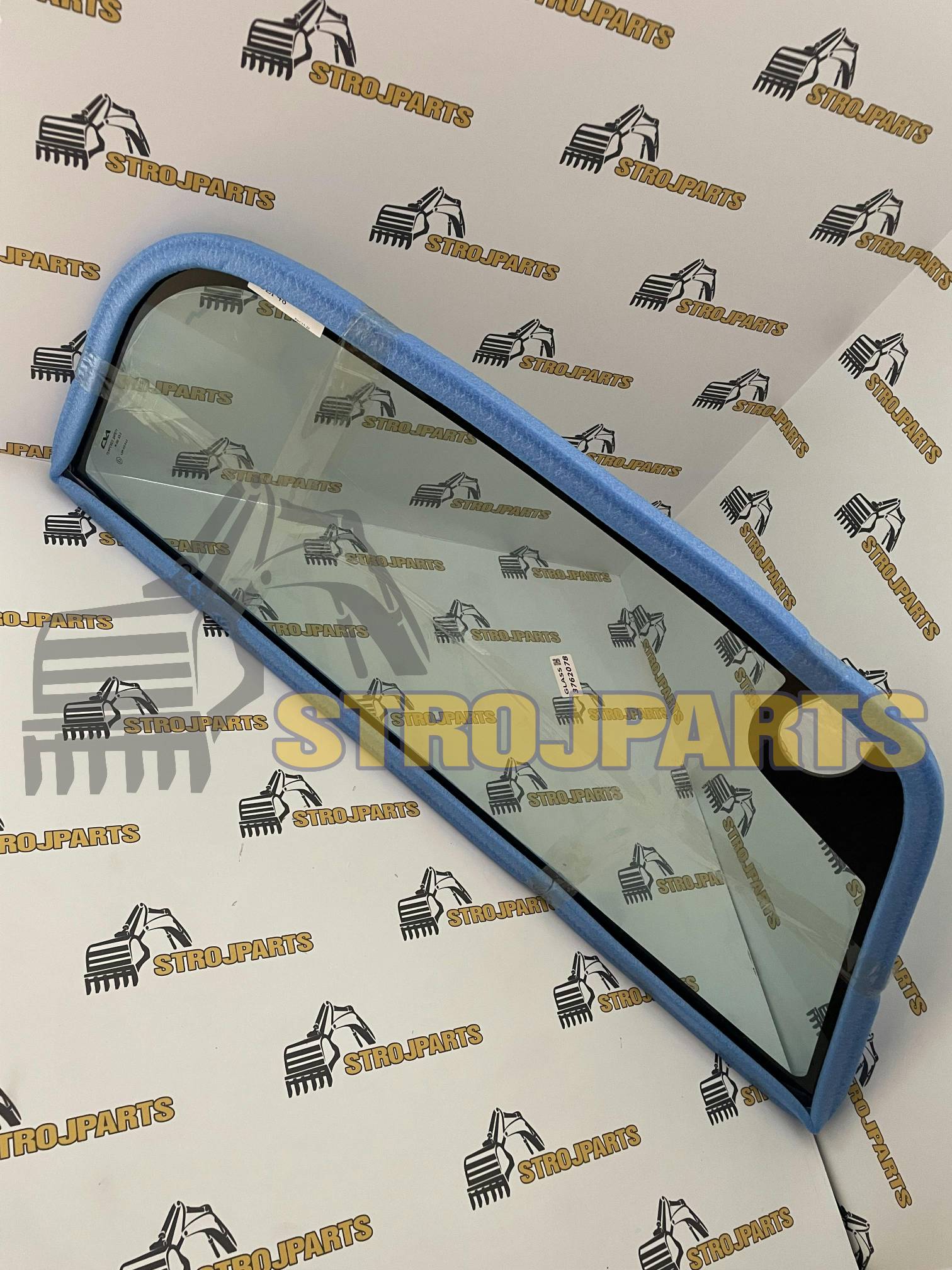 BOČNÍ SKLO LEVÉ TVRZENÉ BEZBARVÉ SE SÍTOTISKEM CAT